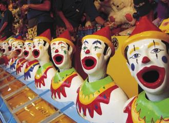 Amusement park game clowns with mouths open
